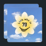 70th Birthday Party Summer Sunshine Invitation<br><div class="desc">White flower graphic with glowing sunshine,  smile,  and eyeballs on a blue summer sky background for a 70th birthday party.
All text can be changed.</div>