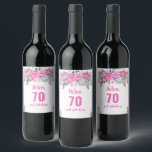 70th birthday pink floral wine label<br><div class="desc">Elegant design for a 70th birthday party with a pink "70 & fabulous" and a scripted name,  embellished by a feminine floral design on a white background. Customise name,  age,  text and background colour.</div>