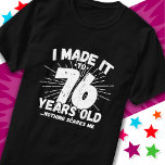76 Year Old Sarcastic Meme Funny 76th Birthday T-Shirt<br><div class="desc">This funny 76th birthday design makes a great sarcastic humour joke or novelty gag gift for a 76 year old birthday theme or surprise 76th birthday party! Features 'I Made it to 76 Years Old... Nothing Scares Me' funny 76th birthday meme that will get lots of laughs from family, friends,...</div>