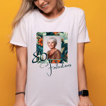 80 and Fabulous Flower Pattern Birthday Photo T-Shirt<br><div class="desc">Elegant 80 and Fabulous Flower Pattern Birthday Photo T-Shirt. 80 and fabulous text in trendy script and an elegant and beautiful flower pattern. Personalise it with your name and photo,  and make personalised elegant floral birthday t-shirt for her.</div>