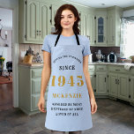 80th Birthday 1945 Name Chic Elegant Blue Gold Apron<br><div class="desc">Elegant Blue & Gold Chic Apron - 80th Birthday 1945 Name Personalised Kitchen & BBQ Essentials. Celebrate a fabulous birthday with style and practicality! This elegant chic apron is the perfect accessory for the culinary enthusiast in your life. Its eye-catching design, enhanced with a touch of gold, adds a charming...</div>