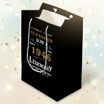 80th Birthday 1946 Add Name Legend Black Gold Medium Gift Bag<br><div class="desc">Celebrate a special milestone with this 80th birthday born 1946 Legendary Black Gold Medium Gift Bag. Printed with a classic design in black, and gold, this gift bag is perfect for holding presents, cards, and other special tokens for the big day. Add your loved one's name to the bag for...</div>