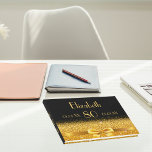 80th birthday black gold bow classic elegant  guest book<br><div class="desc">Elegant,  classic,  glamourous and feminine.  A gold coloured ribbon with a bow.  Black background. Templates for name,  age,  date of birth and anniversary date. Spine: add name and date.</div>