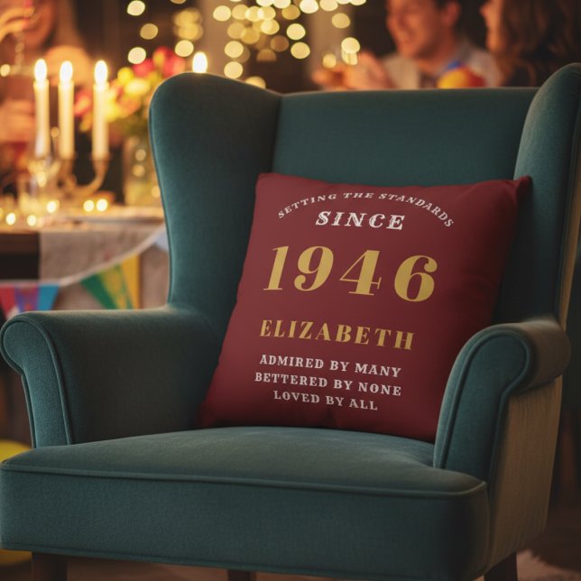 80th Birthday Born 1946 Loved Add Your Name Red Cushion (1946 custom throw pillow on an armchair)