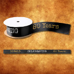 80th Birthday Legendary Black Gold Retro Satin Ribbon<br><div class="desc">For those celebrating their 80th birthday we have the ideal birthday party ribbon with a vintage feel. The black background with a white and gold vintage typography design design is simple and yet elegant with a retro feel. Easily customise the text of this birthday gift using the template provided. Part...</div>