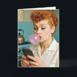 80th Birthday Lucille Ball Texting On a Cell Phone Card<br><div class="desc">A woman with vintage red,  curly hair blows a bubble with pink gum while texting on her smartphone in a retro kitchen for 80th birthday.
Age and year can be changed.</div>