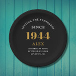 80th Birthday Name 1944 Black Gold Elegant Chic<br><div class="desc">Sophisticated 80th Birthday Unique Black & Gold Party Paper Plates. Celebrating a milestone birthday should be a memorable experience, and what better way to ensure that than with our sophisticated black and gold 80th Birthday Party Paper Plates? Designed in sleek black with an elegant gold highlight, these plates are printed...</div>