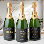80th Birthday Name 1945 Black Gold Elegant Chic Sparkling Wine Label<br><div class="desc">Vintage Birthday Black & Gold Elegant Label. Celebrate your milestone with our exclusive sparkling wine birthday label. The meticulously designed label with stunning black and gold hues effortlessly enhances the visual appeal of your favourite sparkling wine. The year prominently featured on the label, adds a nostalgic throwback to the year...</div>