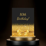 80th birthday party black gold bow invitation<br><div class="desc">Elegant,  classic,  glamourous and feminine style party invitation.  A gold coloured ribbon and bow. Black background. With the text: 80th Birthday! on front

Add your event details on back.</div>