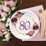 80th birthday party burgundy florals gold white paper plate<br><div class="desc">A plate for a 80th birthday party. A chic white background with a faux gold geometric frame. Decorated with dark purple and burgundy flowers, roses and boho style feathers. Templates for a name, age 80 and a date. Date of birth or the date of the party. The name is written...</div>