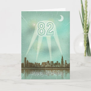 82nd Birthday card with a city and spotlights