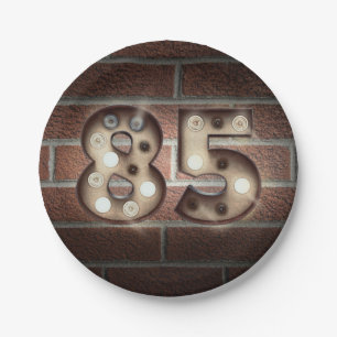 85th birthday marquee sign on brick wall paper plate