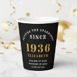 90th Birthday Setting the Standards Black Gold Paper Cups<br><div class="desc">Celebrate a magnificent life and a major milestone with these elegant 90th Birthday paper cups. Featuring a stylish black background, this design is accented with luxurious gold lettering, perfect for an elevated, chic, and sophisticated party theme. The bold "1936" proudly proclaims the year they set the standard, while the custom...</div>
