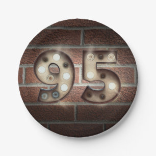95th birthday marquee sign on brick wall paper plate