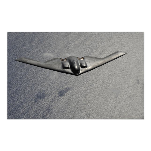 A B-2 Spirit flies over the Pacific Ocean Photo Print (Front)