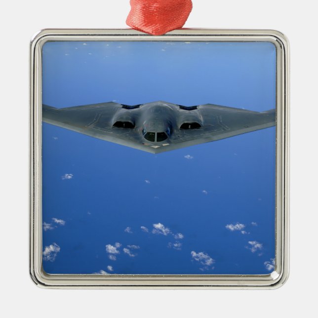 A B-2 Spirit soars through the sky Metal Tree Decoration (Front)