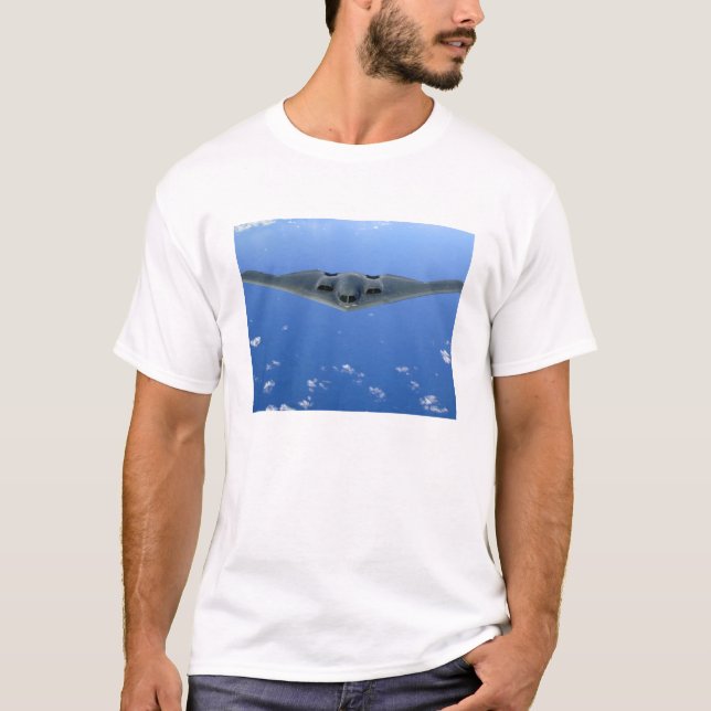 A B-2 Spirit soars through the sky T-Shirt (Front)