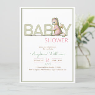 A baby shower invitation with an adorable dragon.