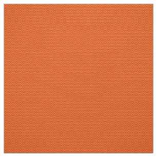 A background pattern featuring an orange and peach fabric