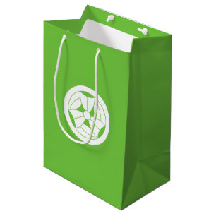 a bamboo leaf that is broken three times in a circ medium gift bag