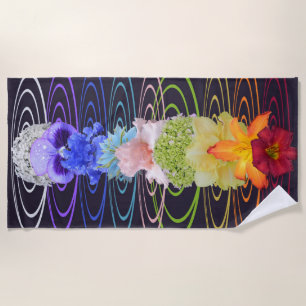 A beautiful base of seven chakras of flowers beach towel