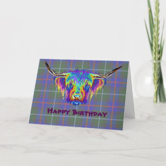 A beautiful colourful highland cow on tartan. card