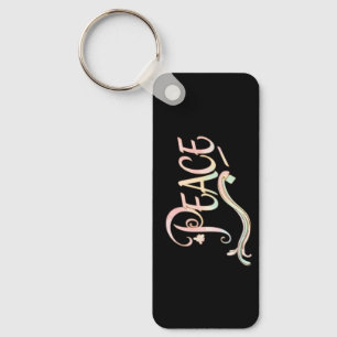 A beautiful, flowing script of the word "Peace" fe Key Ring