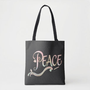 A beautiful, flowing script of the word "Peace" fe Tote Bag