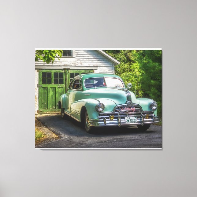 A beautiful, two-tone 1947 Pontiac Torpedo rests p Canvas Print (Front)