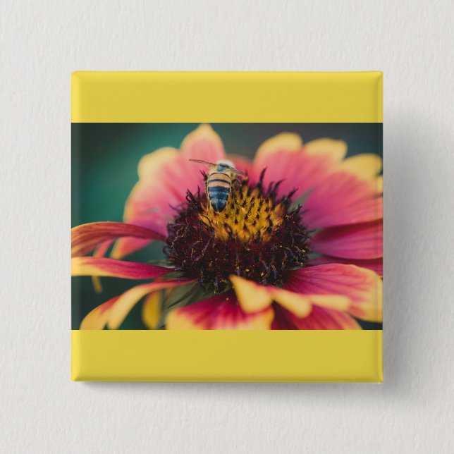 A bee on a flower 15 cm square badge (Front)