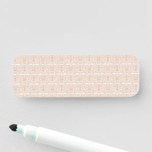 a beige and white chequered pattern on a white bac name tag