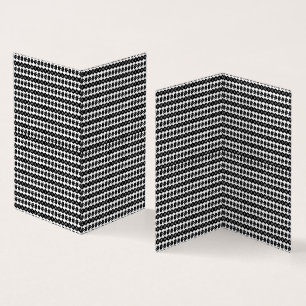 a black and white background with a lot of dots