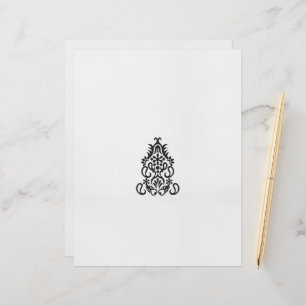 a black and white image of an ornate design