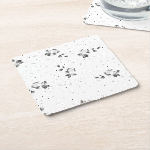 a black and white photo of a bunch of dots square paper coaster