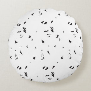 a black and white photo of a flock of birds round cushion
