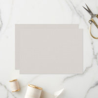 a black and white photo of a man in a suit and tie