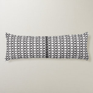 a black and white photo of a pattern body cushion
