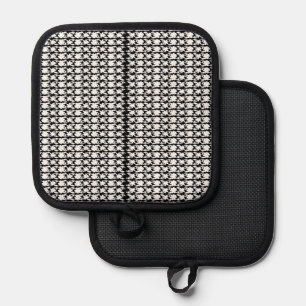 a black and white photo of a pattern pot holder