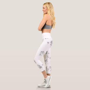 a black and white photo of bubbles on a white back capri leggings