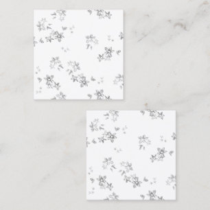 a black and white photo of snow flakes calling card