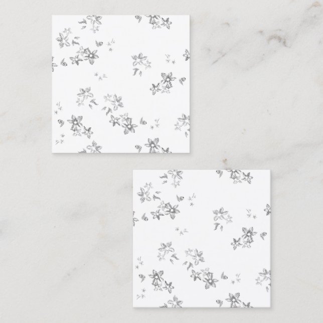 a black and white photo of snow flakes calling card (Front/Back)