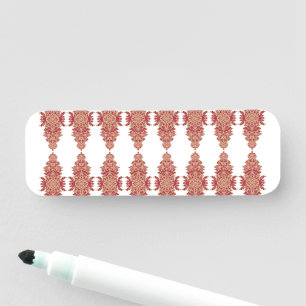 a black background with a red pattern on it name tag