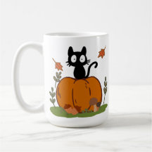 A black cat sitting on a pumpkin