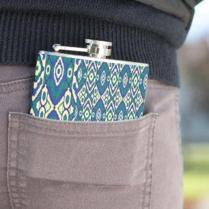 a blue and green pattern with a white background hip flask