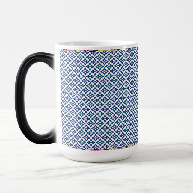 a blue and green pattern with a white background magic mug (Left)