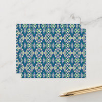 a blue and green pattern with a white background