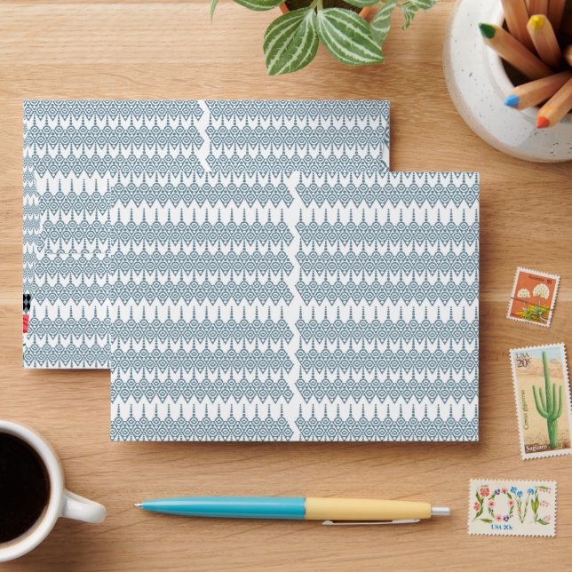 a blue and white pattern with a white background envelope (Desk)