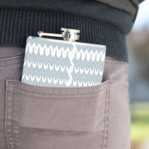 a blue and white pattern with a white background hip flask