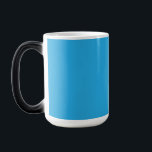 a blue background with a black and white cat magic mug<br><div class="desc">Explore the charming contrast of a black and white cat against a serene blue background. This captivating image captures the essence of a beloved pet on a unique backdrop."</div>