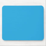a blue background with a black and white cat on to mouse pad<br><div class="desc">Add a pop of colour and character to your walls with this vibrant blue background showcasing an adorable black and white cat. The seamless blend of colours and the intricate detailing of the cat create a visually appealing focal point in any room. Perfect for cat lovers and art enthusiasts alike,...</div>